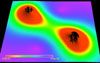 Snapshot showing the field representing
	gravitational wave generated from an inspirallying black hole binary at time equals 3